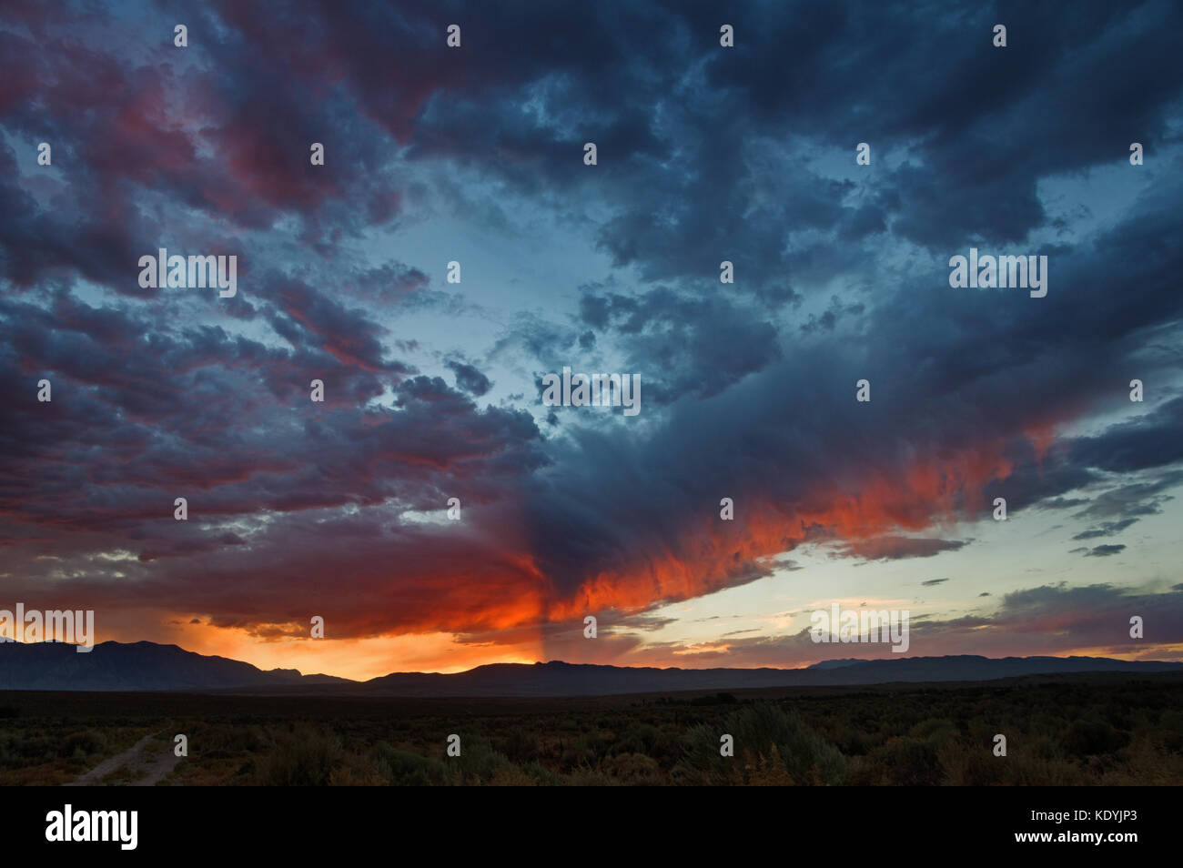 dramatic sunset over the Owens Valley with distant mountains Stock Photo