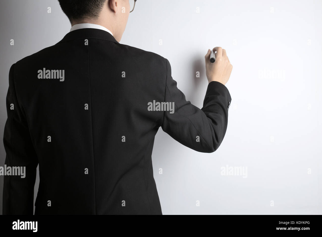 businessman is writing Stock Photo - Alamy