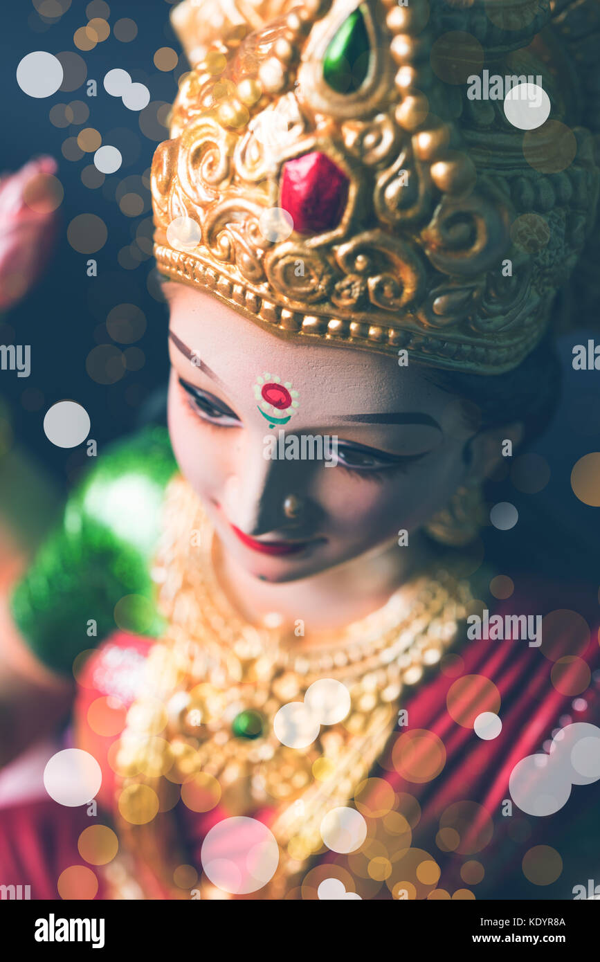 Idol worshipping of Hindu Goddess Lakshmi - Lakshmi Puja is a Hindu  religious festival that falls on Amavasya (new moon day) which is the third  day o Stock Photo - Alamy, image size:867x1390
