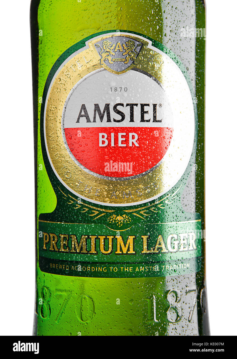 LONDON, UNITED KINGDOM - NOVEMBER 01, 2016: Cold bottle of Amstel Premium Lager on white background.Amstel is an internationally known brand of beer p Stock Photo