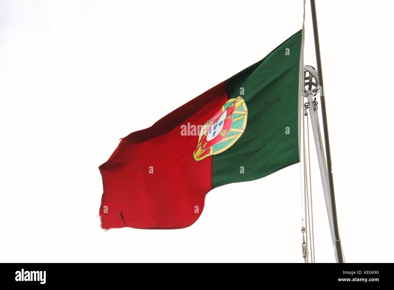 Backwards facing Portuguese Flag fluttering in the wind on a flagpole at Fortaleza do Pico in Funchal, Madeira Stock Photo