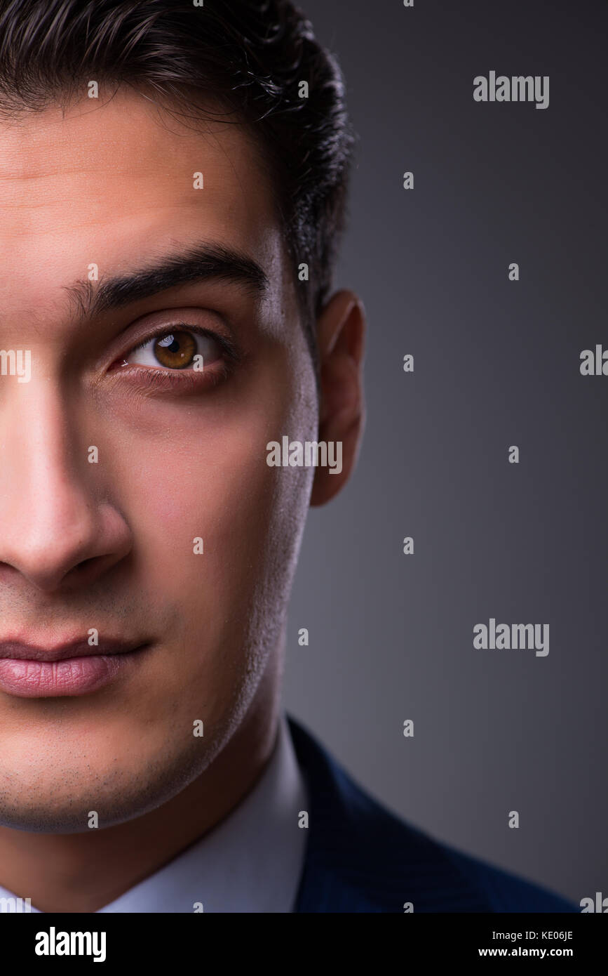 Portrait of young handsome businessman Stock Photo - Alamy