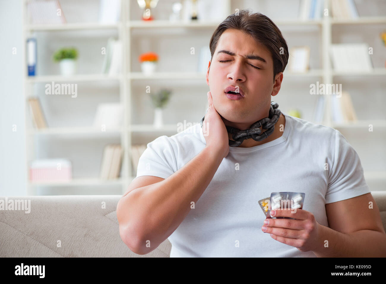 Young man suffering from sore throat Stock Photo Alamy