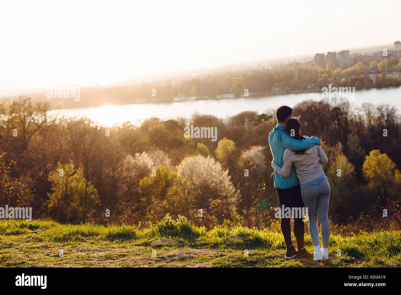 Happy young sporty couple sharing romantic moments Stock Photo - Alamy