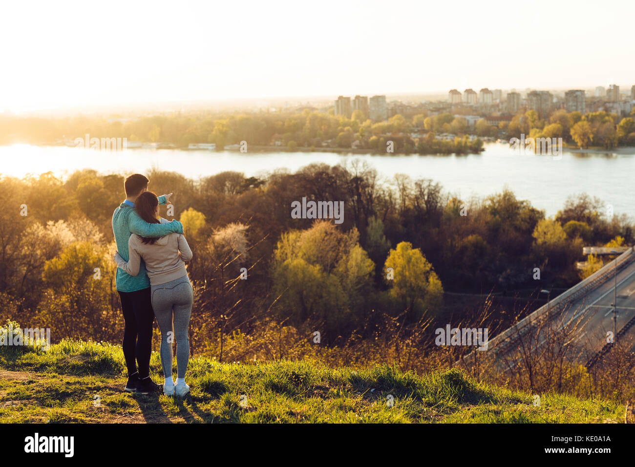 Happy young sporty couple sharing romantic moments Stock Photo - Alamy