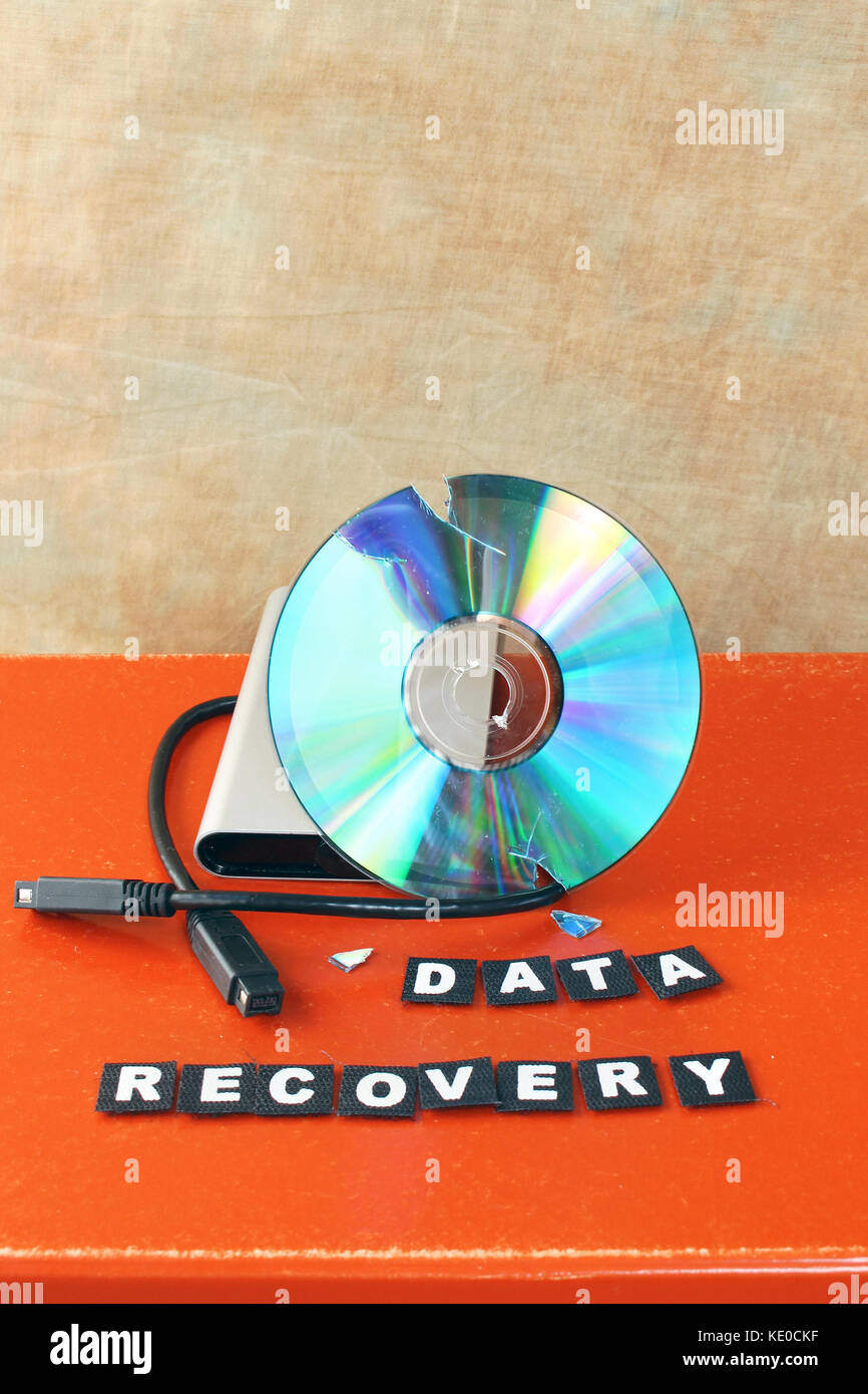 Broken DVD disc brought for data recovery Stock Photo - Alamy