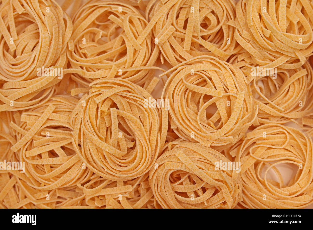 Freshly hand made Italian tagliatelle pasta nests Stock Photo Alamy