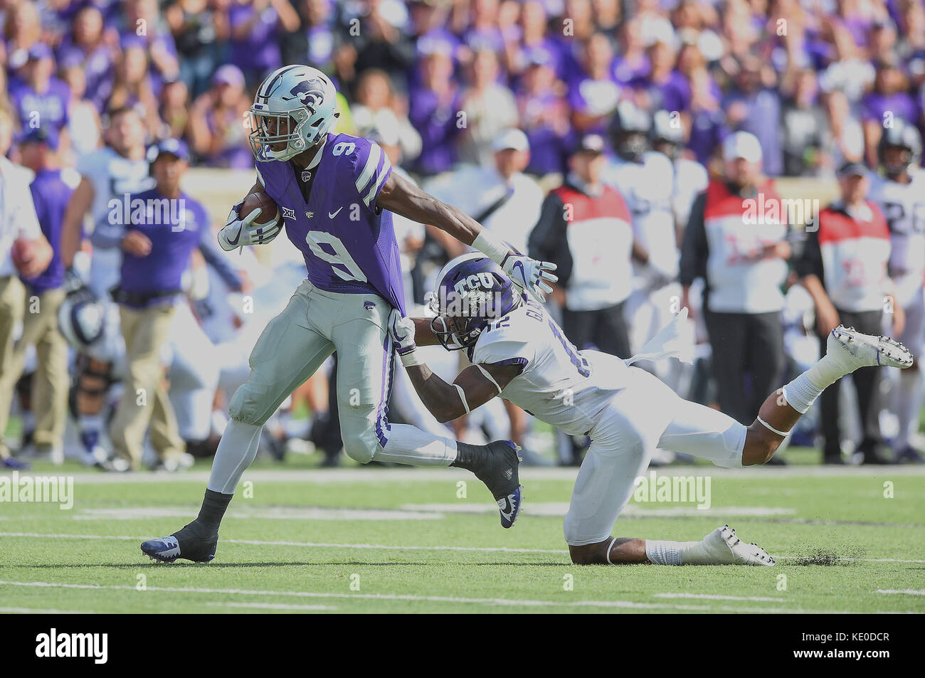 Manhattan, Kansas, USA. 14th Oct, 2017. TCU Horned Frogs cornerback Jeff Gladney (12) tries to tackle Kansas State Wildcats wide receiver Byron Pringle (9) by his jersey during the NCAA Football Game between the TCU Horned Frogs and the Kansas State Wildcats at Bill Snyder Family Stadium in Manhattan, Kansas. Kendall Shaw/CSM/Alamy Live News Stock Photo