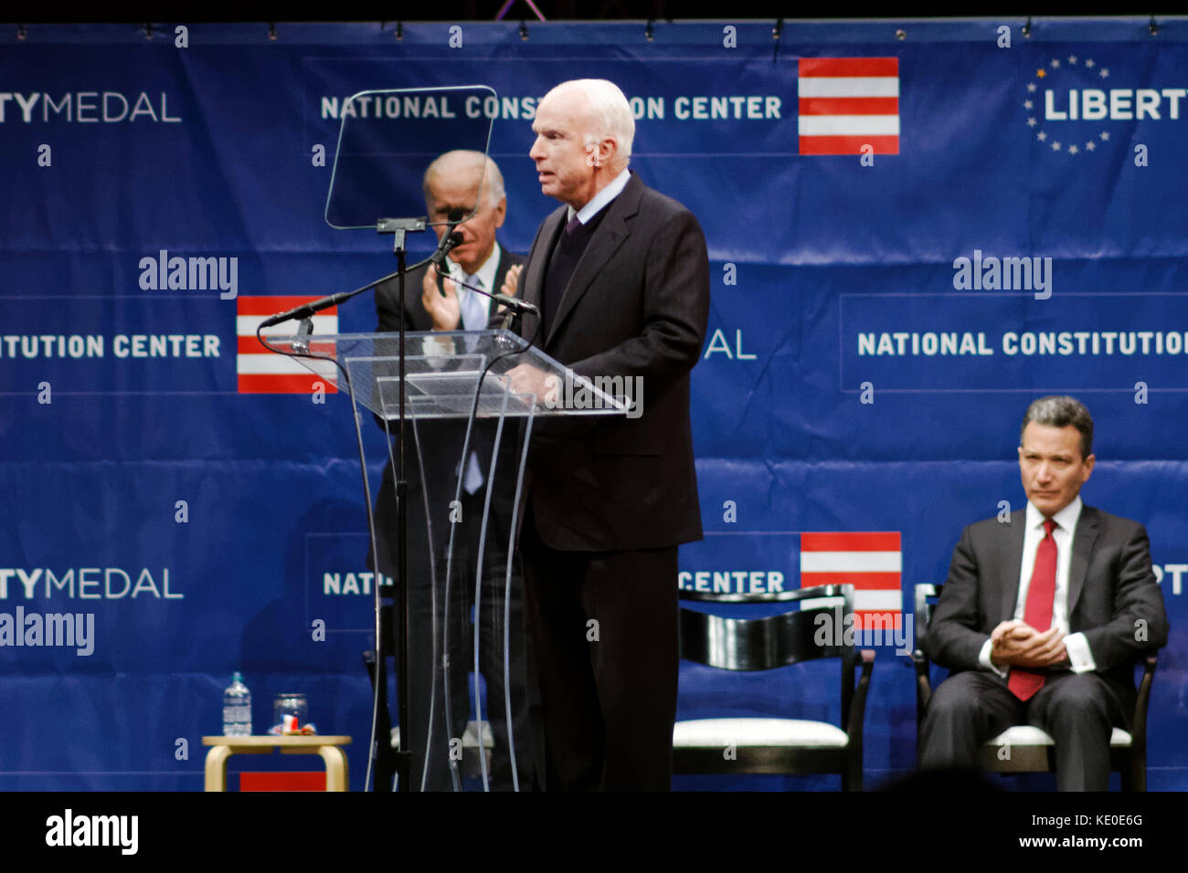 Philadelphia, United States. 16th Oct, 2017. US Senator John McCain (R-AZ) receives the 2017 Liberty Medal out of hands of former VP Joe Biden, during October 16, 2017 a ceremony at the Constitution Center, in Philadelphia, PA. In his speech McCain warns against 'Spurious Nationalism'. Credit: Bastiaan Slabbers/Alamy Live News Stock Photo