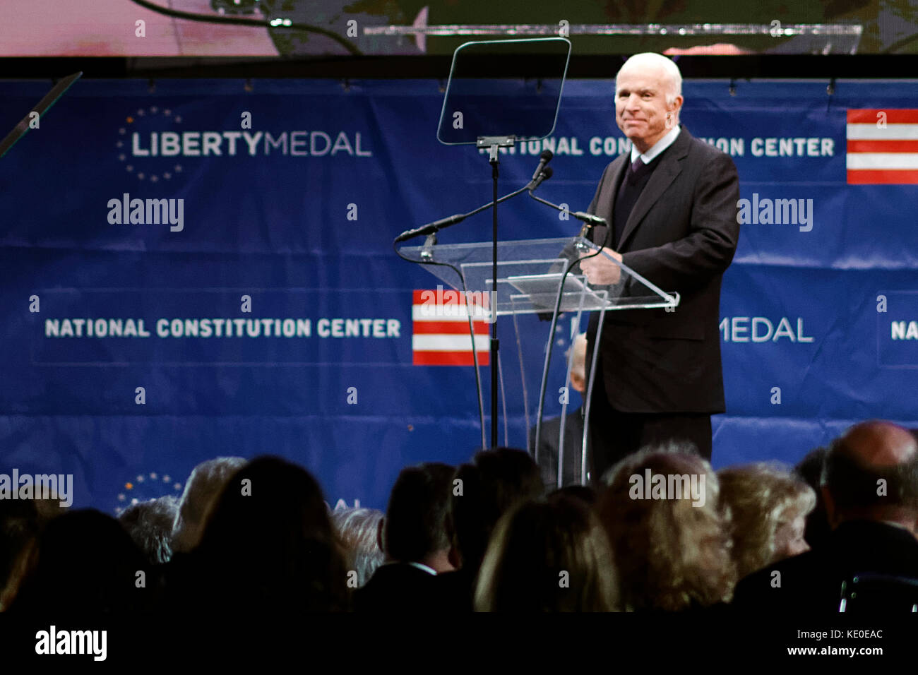 Philadelphia, United States. 16th Oct, 2017. US Senator John McCain (R-AZ) receives the 2017 Liberty Medal out of hands of former VP Joe Biden, during October 16, 2017 a ceremony at the Constitution Center, in Philadelphia, PA. In his speech McCain warns against Spurious Nationalism. Credit: Bastiaan Slabbers Stock Photo