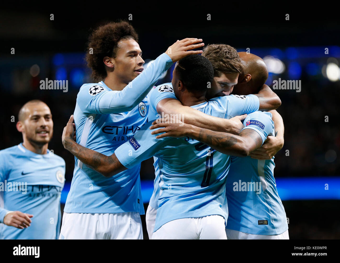Manchester, Manchester. 17th Oct, 2017. Raheem Sterling (C) of Manchester City celebrates after scoring with teammates during the UEFA Champions League Group F match between Manchester City and Napoli at Etihad Stadium, in Manchester, Britain on Oct. 17, 2017. Manchester City won 2-1. Credit: Han Yan/Xinhua/Alamy Live News Stock Photo