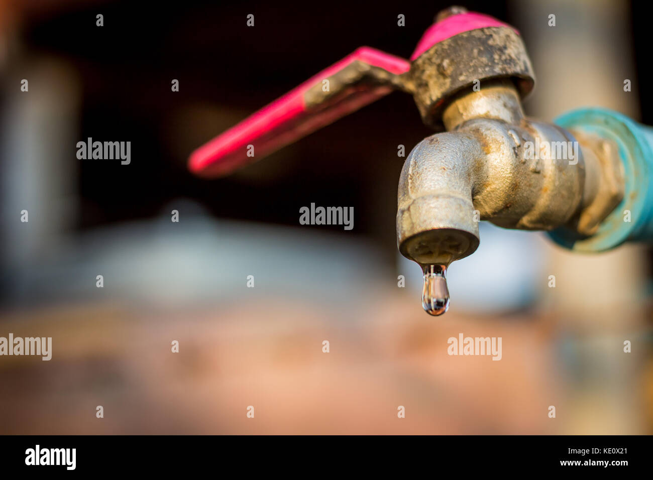 old rusty tap leaking water Stock Photo - Alamy
