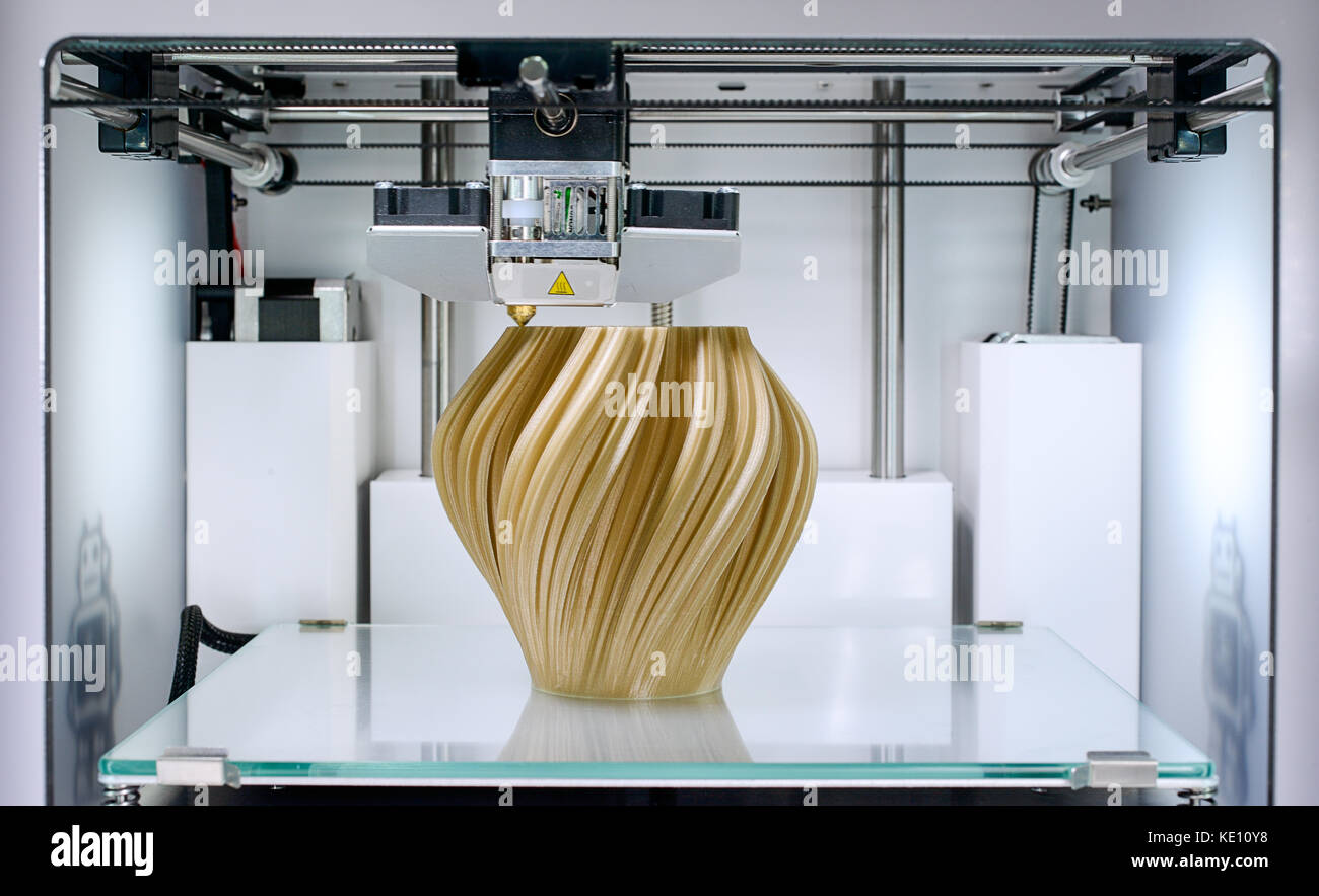 3D printer, printing a fractal vase with PLA -  Vase by BenitoSanduchi licensed under CCA-ShareAlike license. Source: www.thingiverse.com/thing:37117 Stock Photo