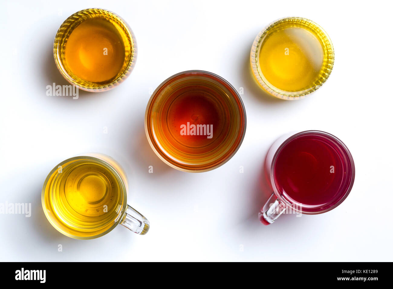 Various herbal teas in glass cups on white background Stock Photo Alamy