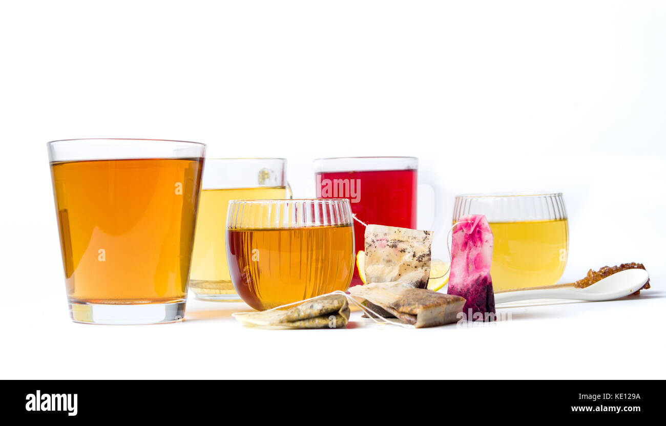 Various herbal teas in glass cups on white background Stock Photo Alamy