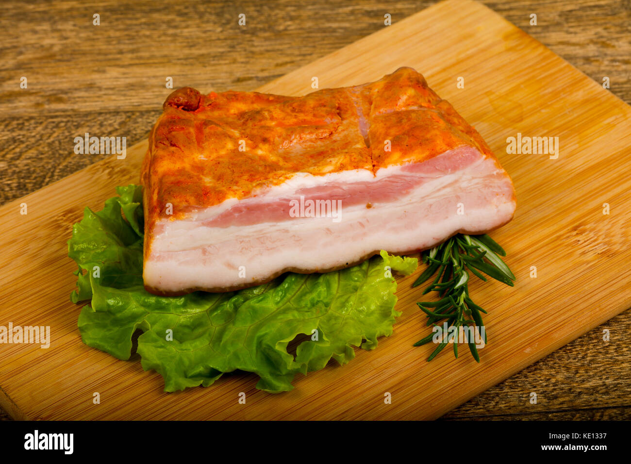 Pork brisket with salad leaves and rosemary Stock Photo Alamy