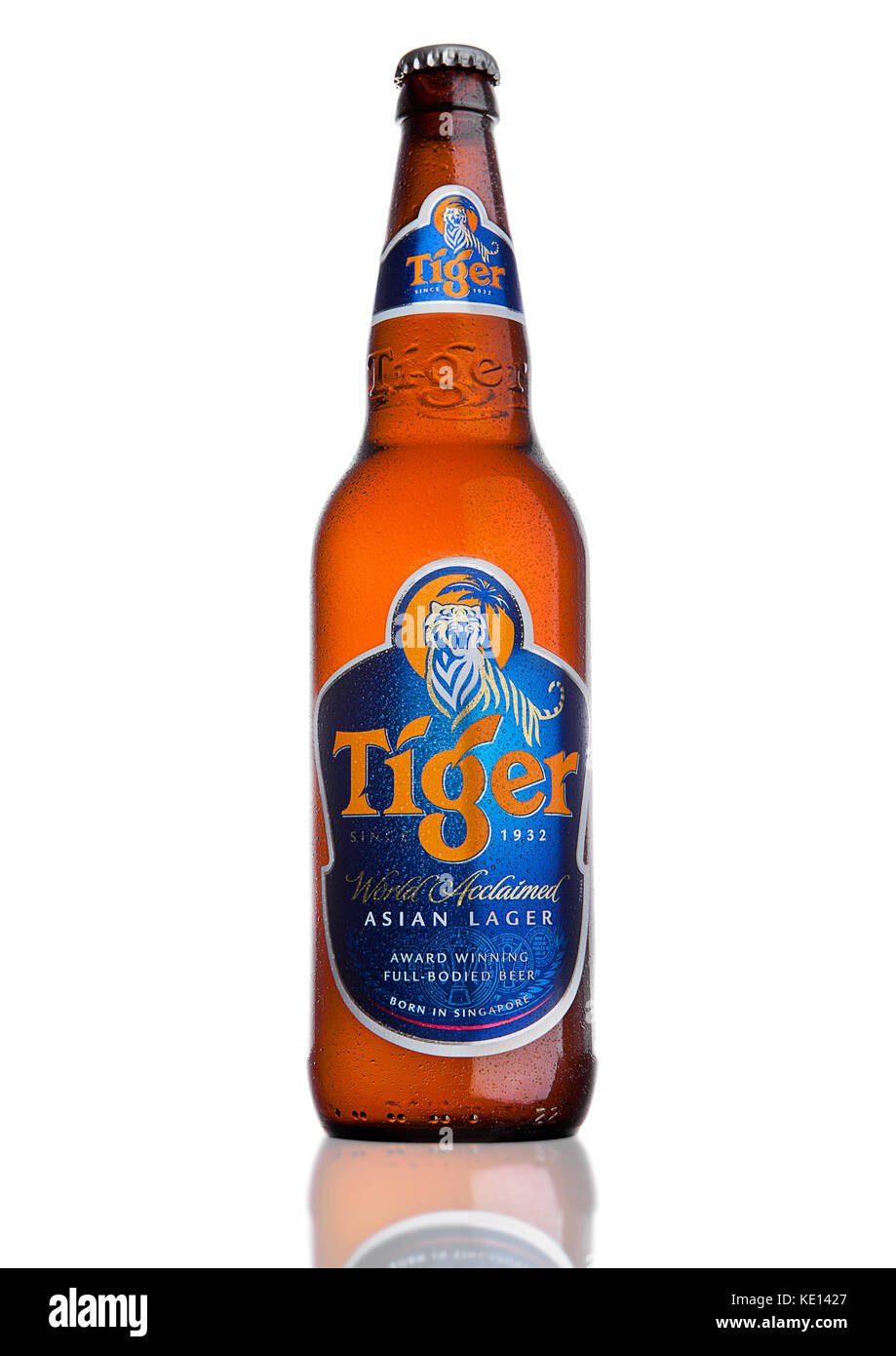 LONDON, UK, DECEMBER 15, 2016: Bottle of Tiger Beer on white background, First launched in 1932 is Singapore's first brewed beer. Stock Photo