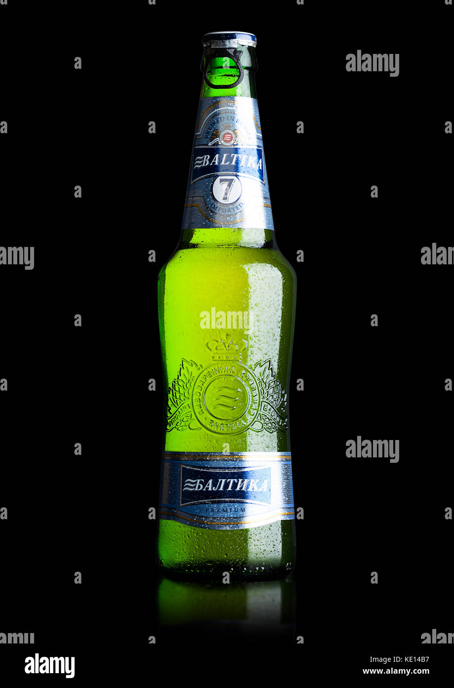 LONDON, UK - MAY 15, 2017: A bottle of Baltika Lager beer number Seven premium on black background. Baltika is the second largest brewing company in R Stock Photo