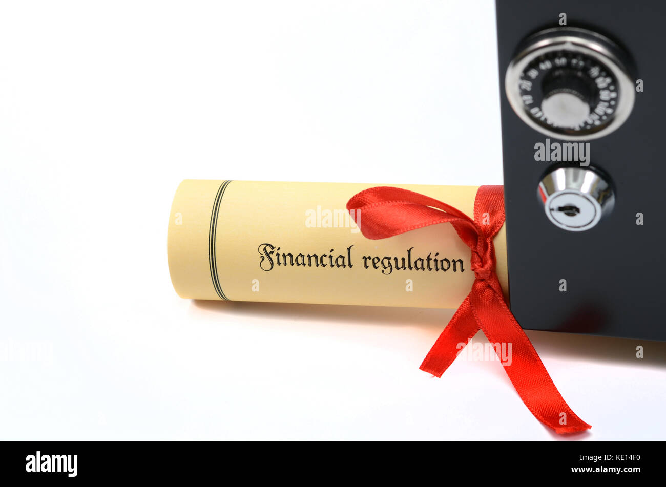 Financial regulation and steel safe on the white backround. Stock Photo