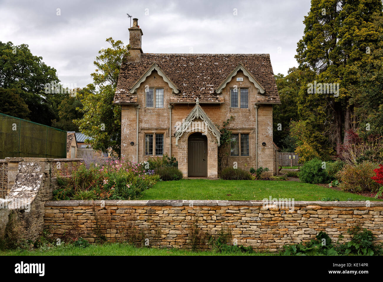 Holly Bush Victorian Keepers Cottage at Westonbirt Arboretum in Gloucestershire, the Cotswolds, England, UK. Stock Photo