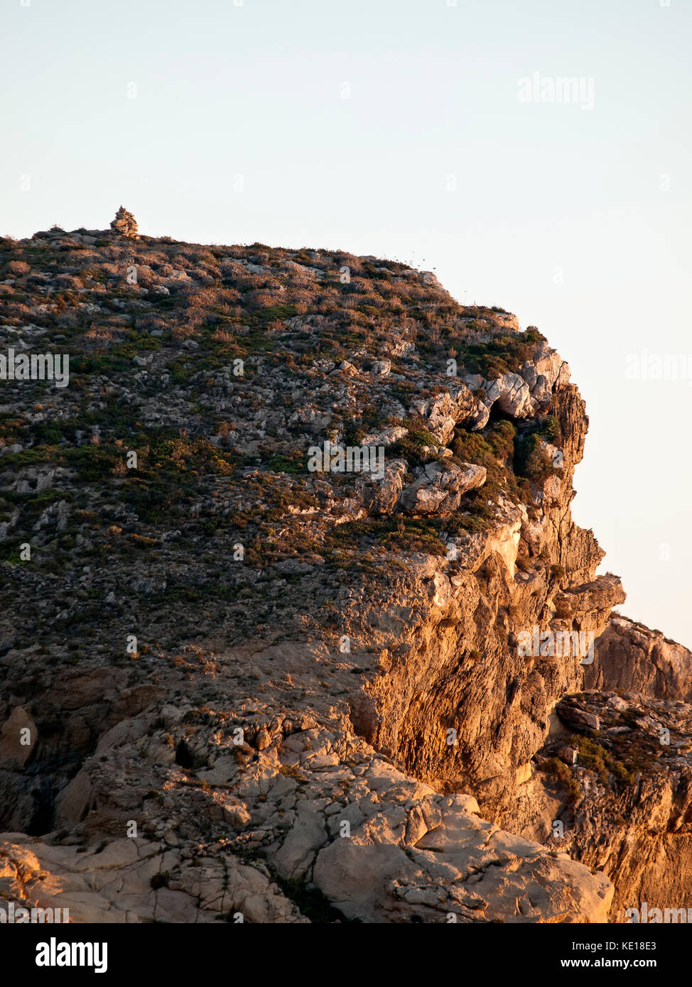 An intriguing pile of stones atop the Fungus Rock at Dwejra in Gozo Stock Photo