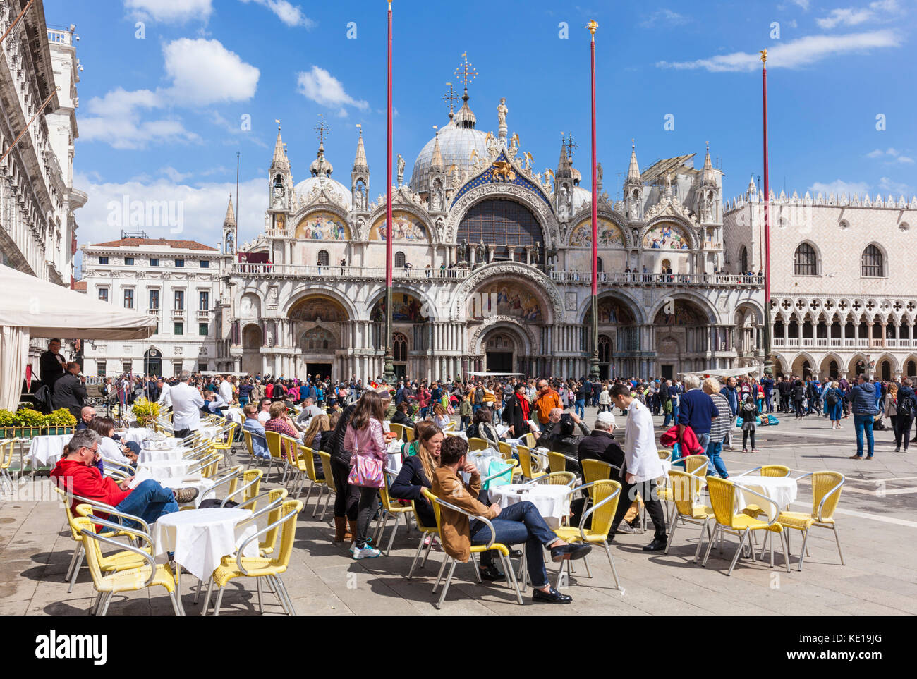 VENICE ITALY VENICE Cafes in St marks Square Piazza san marco in front of the basilica di san marco St. Mark’s Basilica Venice italy EU Europe Stock Photo