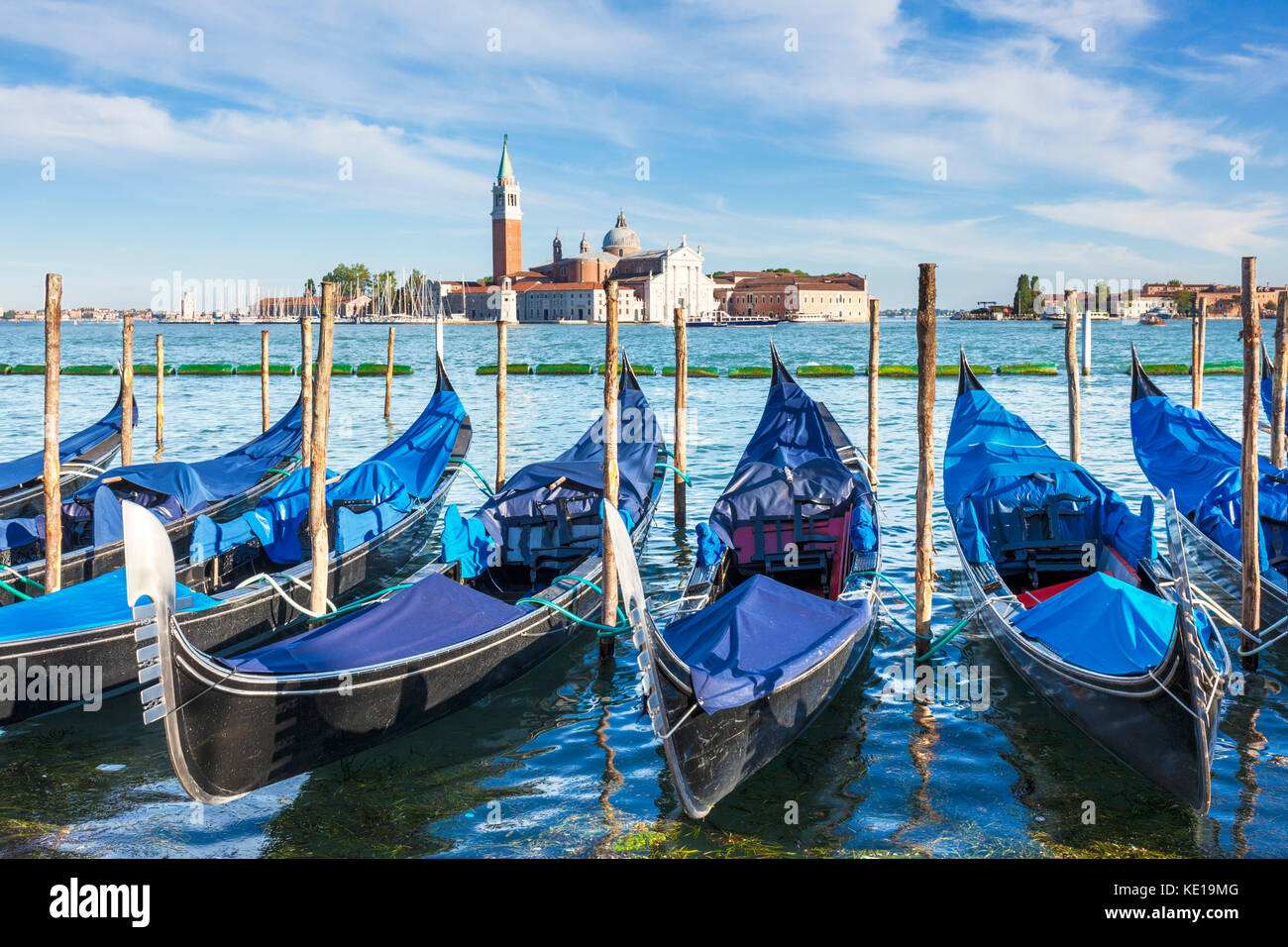 Italy venice italy moored gondolas on the Grand Canal Venice opposite the Island of San Giorgio Maggiore Venice italy eu europe Stock Photo