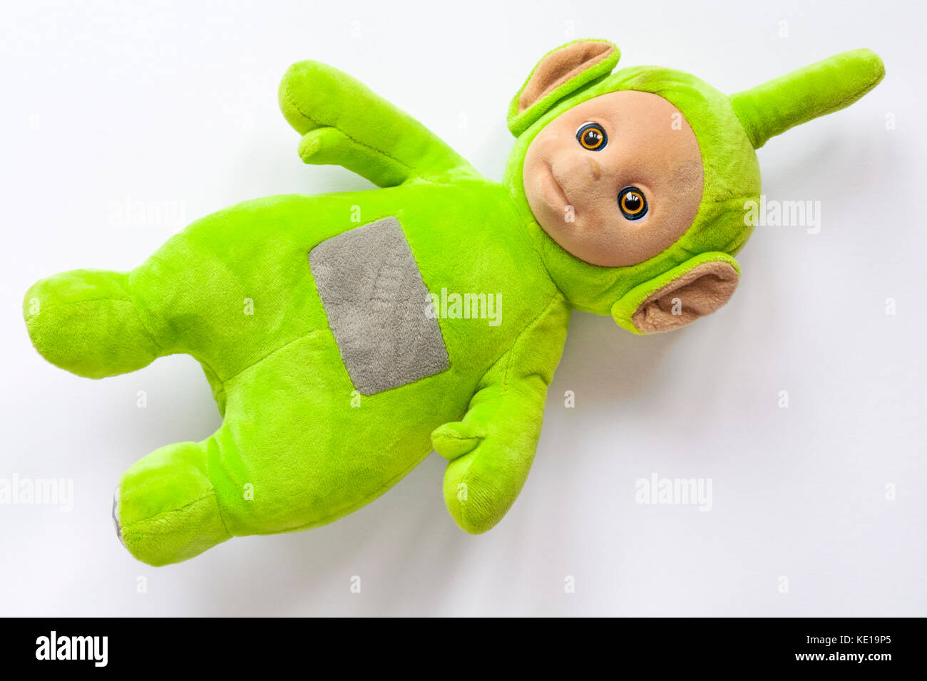 Well loved cuddly Dipsy teletubby doll isolated on white background Stock Photo