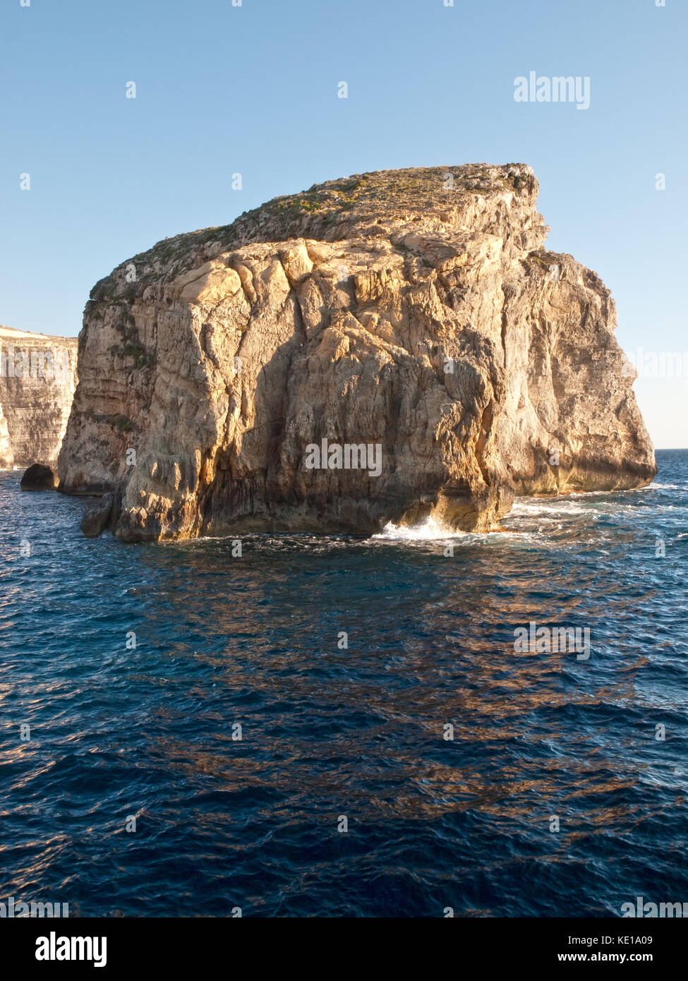 Fungus Rock at Dwejra in Gozo is home to an endemic fungus like plant said to have medicinal qualities Stock Photo