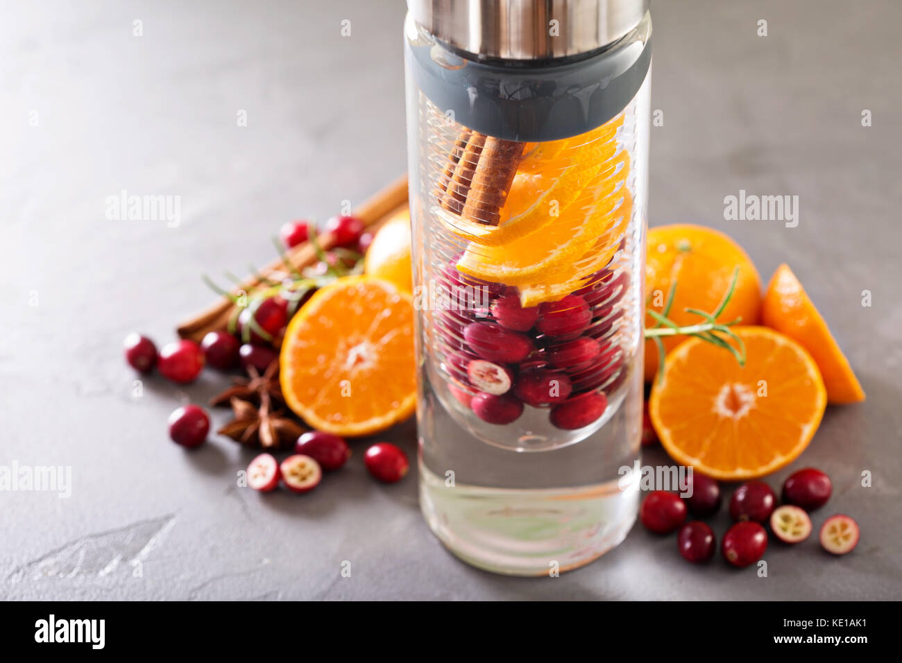 Winter or fall refreshing infused water with cranberry and orange Stock