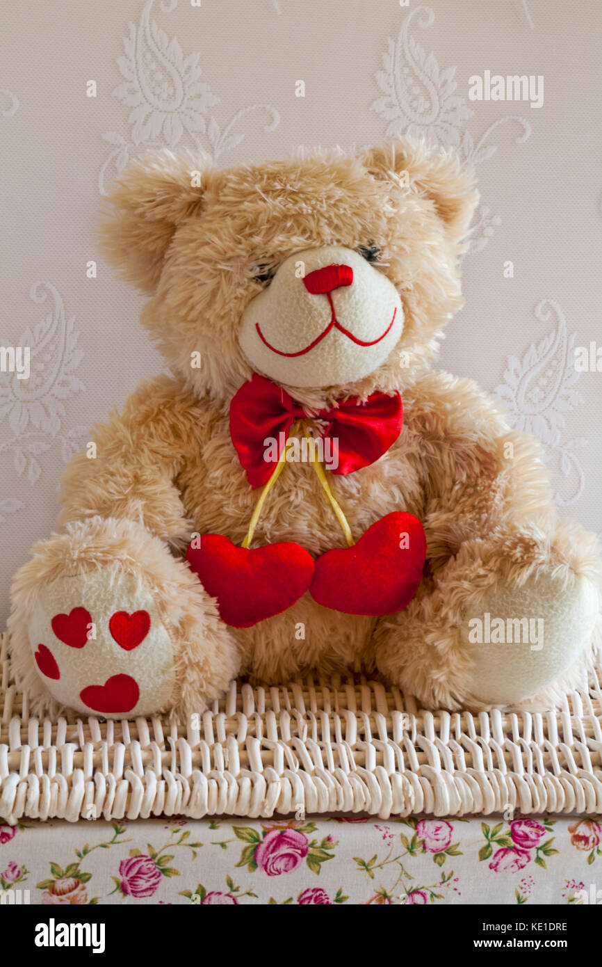 Teddy Bear wearing red bow tie and hearts soft cuddly toy sitting on ...