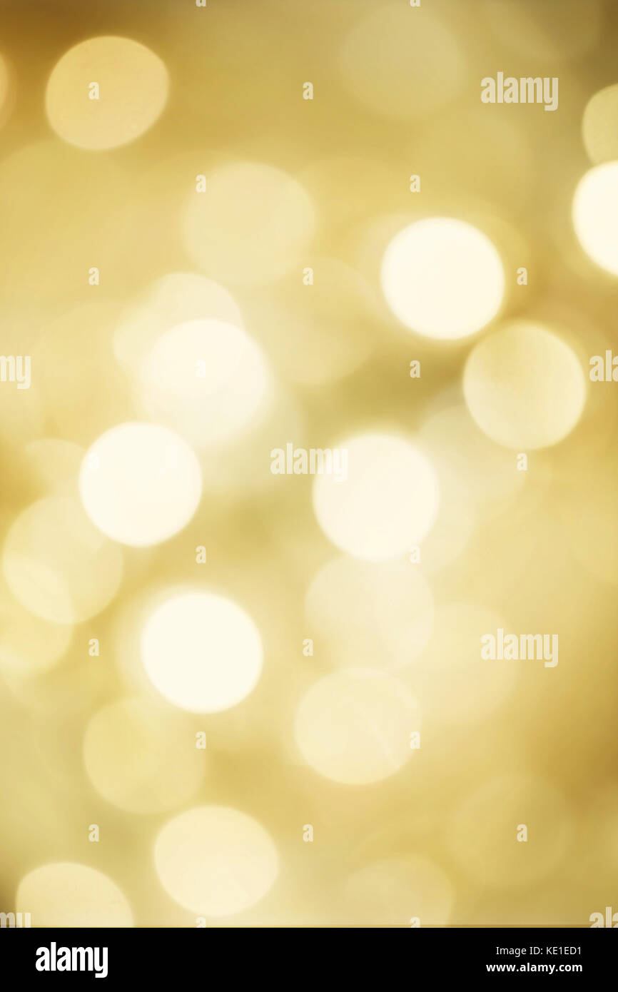Golden blurred bokeh lights for Christmas and New Year celebration ...