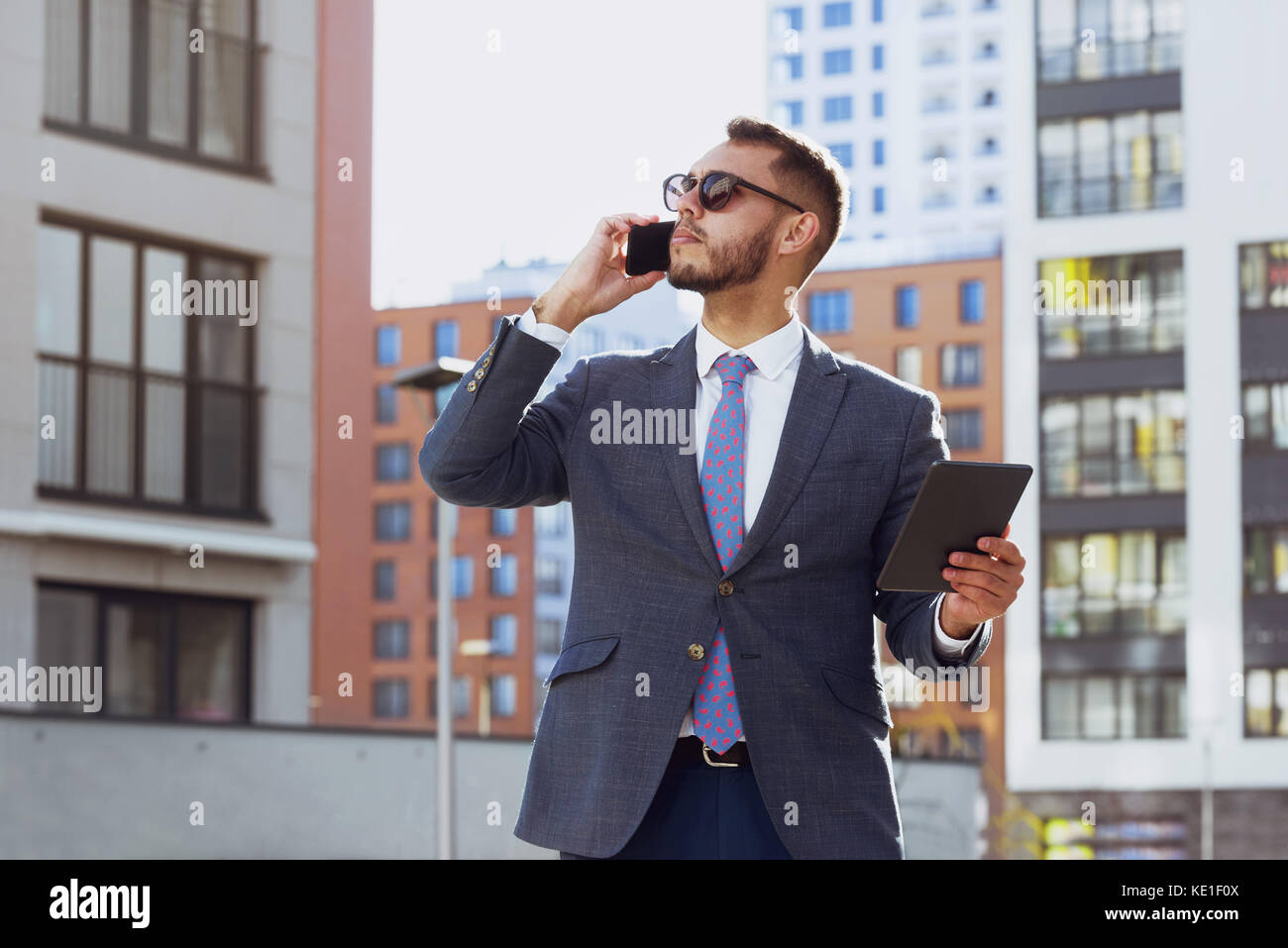 Real estate agent businessman city phone calling Stock Photo Alamy