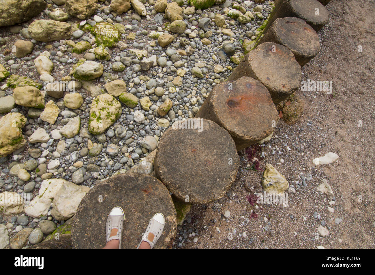 Stepping stones on the beach, point of view and perspective - photo Stock Photo