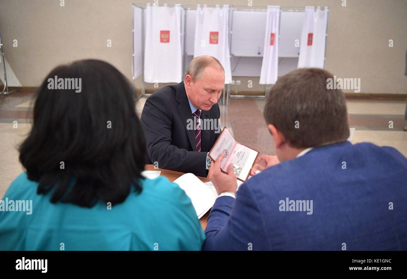 Russian President Vladimir Putin Shows His Identification Papers As He russian-president-vladimir-putin-shows-his-identification-papers-as-he