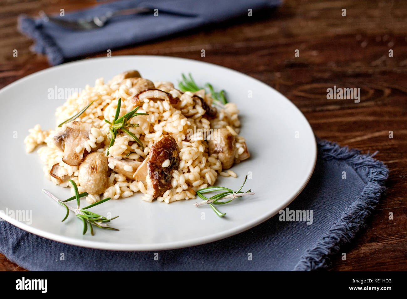 delicious rice with mushrooms and rosemary, risotto Stock Photo - Alamy