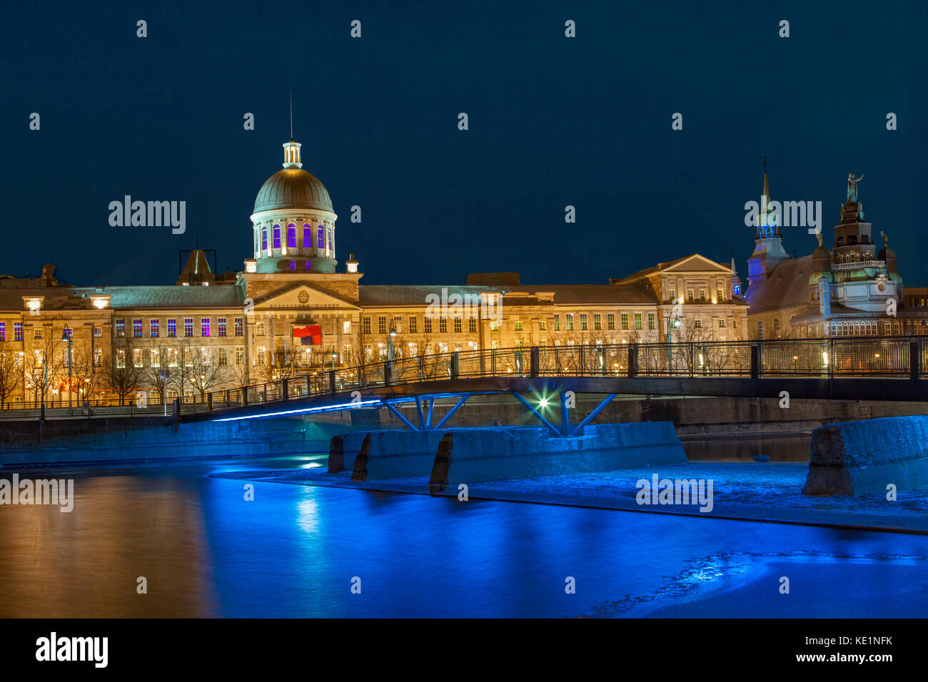 Facade of Bonsecures Market at night from Basin Park including the Basin Park Bridge near the Old Port of Montreal, Quebec, Canada. Stock Photo