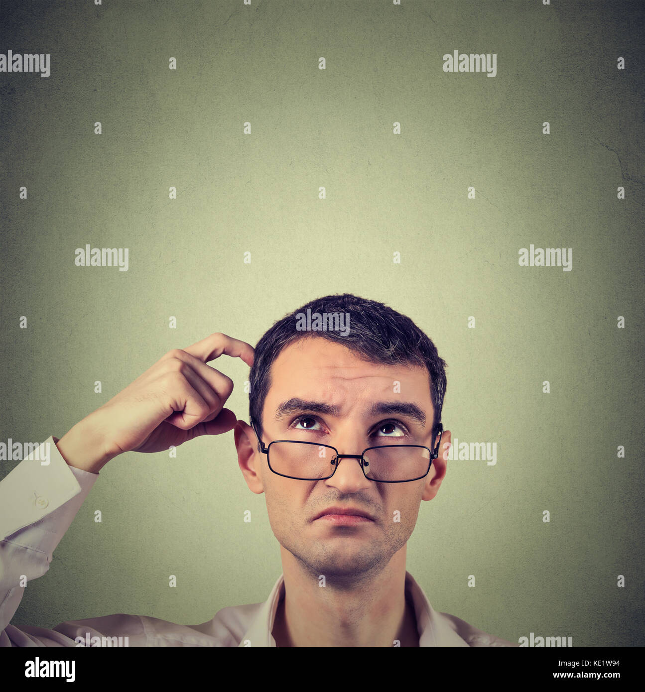 handsome business man thinking Stock Photo Alamy