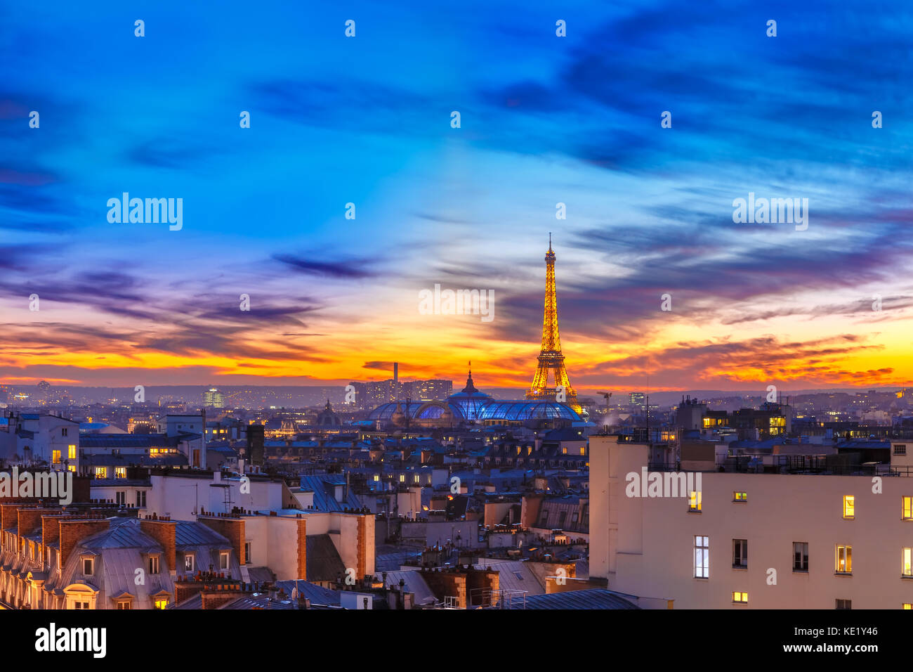 Shimmering Eiffel Tower at sunset in Paris, France Stock Photo