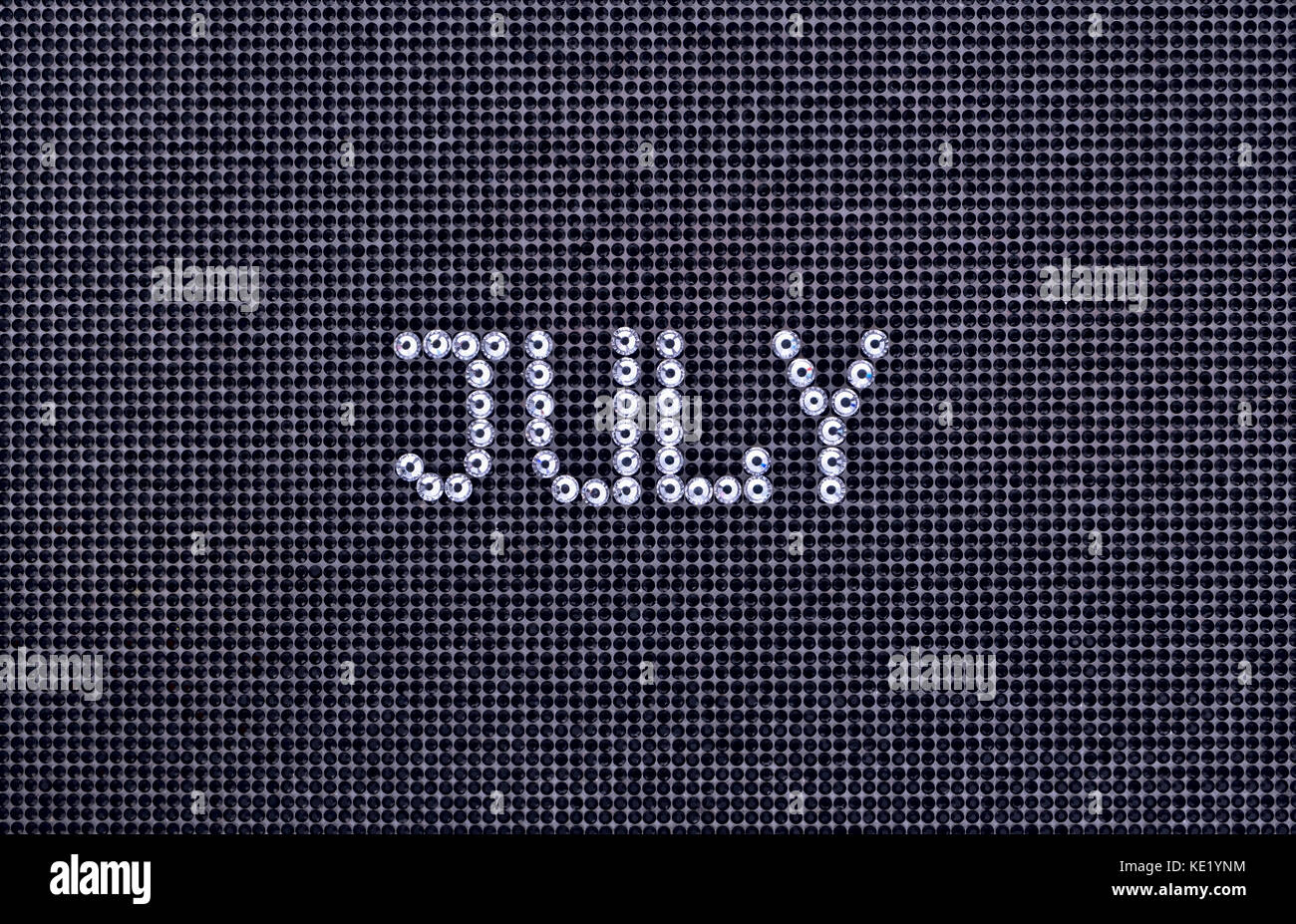 Month JULY is made rhinestones crystal color on a black canvas ...