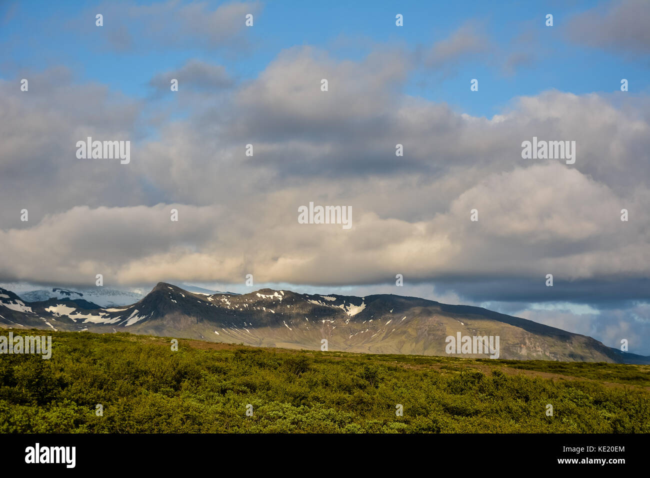 Skaftafell national park mountains and cumulus clouds, Iceland in summer Stock Photo