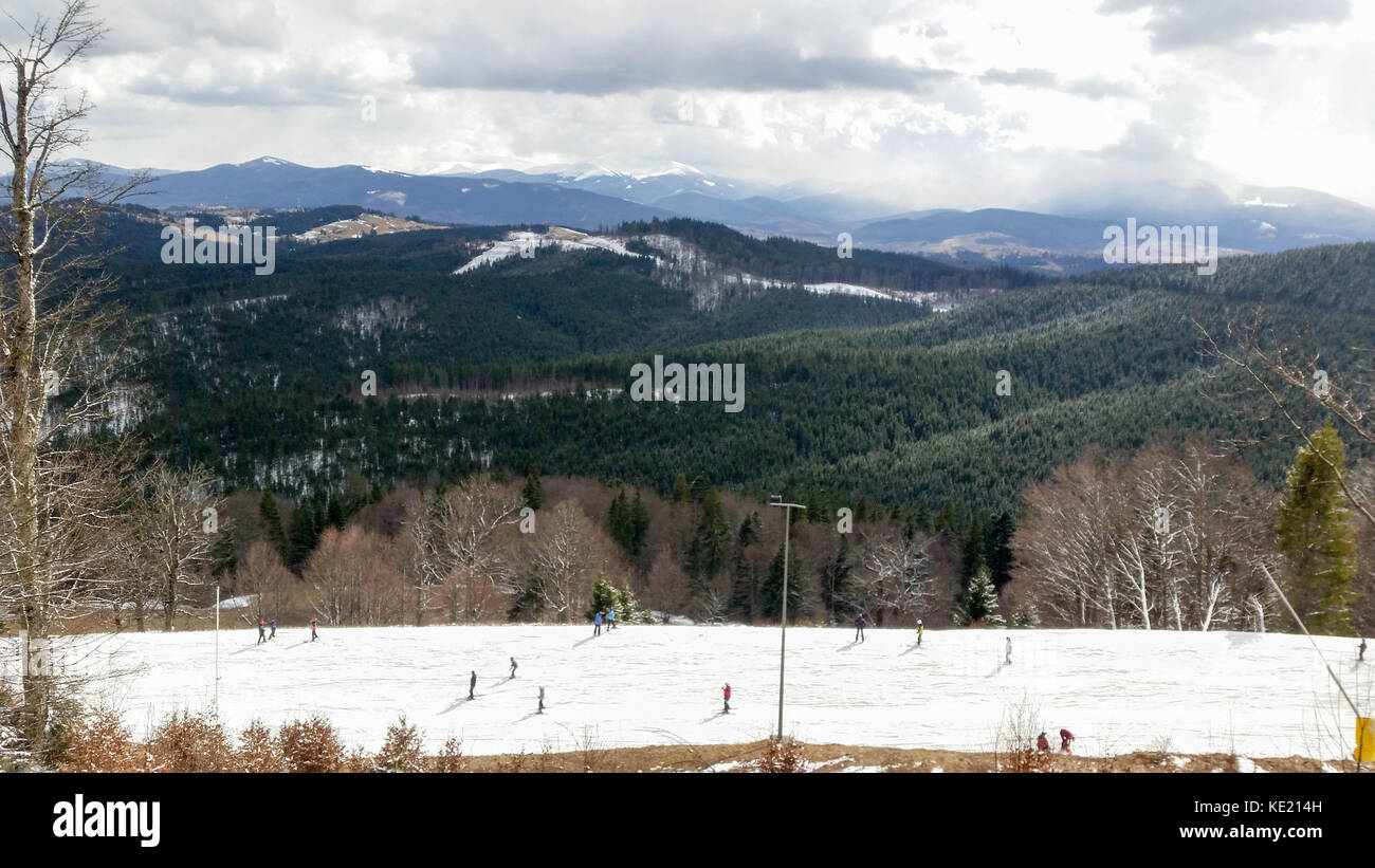 Beautiful winter day in ski resort in caucasian mountains, Bukovel, Ukraine Stock Photo