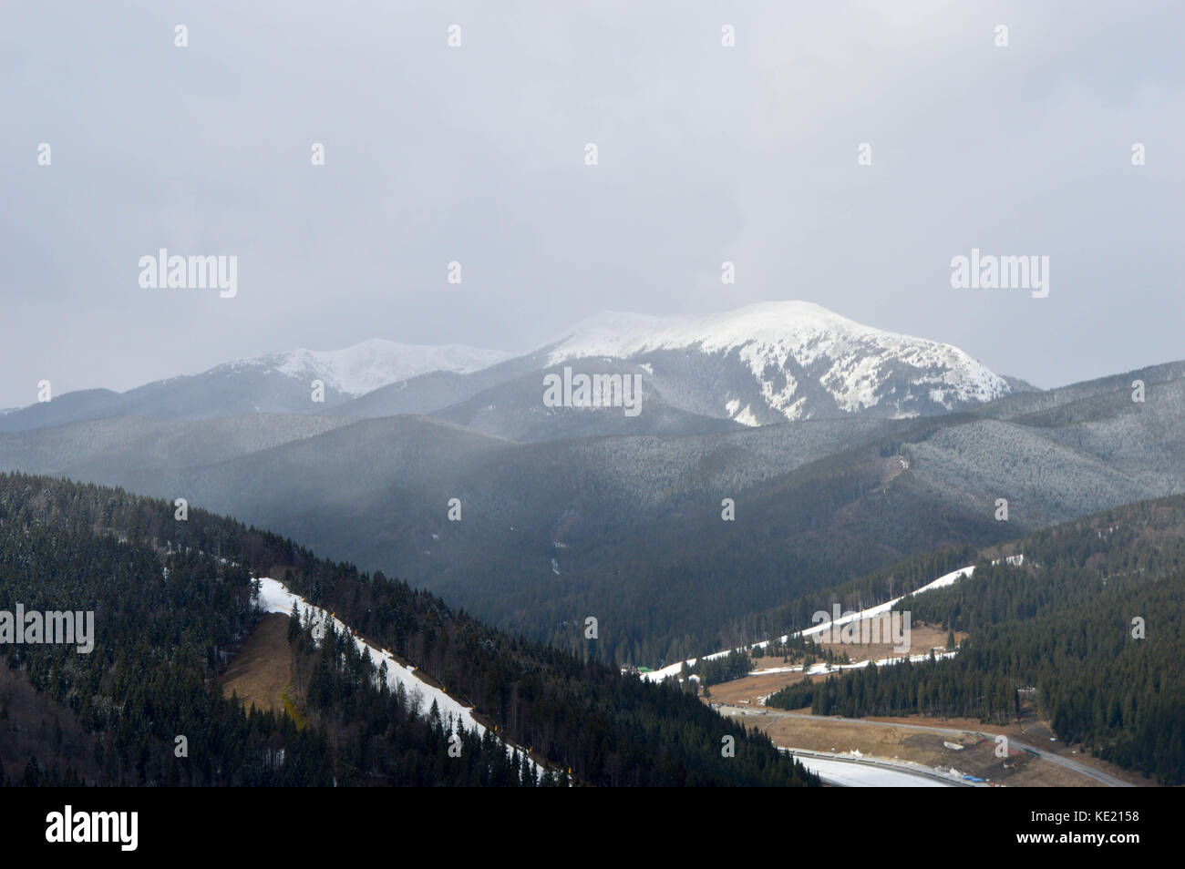 Beautiful winter day in ski resort in caucasian mountains, Bukovel, Ukraine Stock Photo