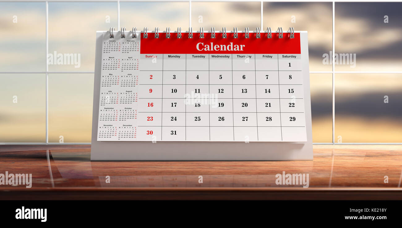 Desk Calendar Isolated On A Wooden Table Abstract Sky Background