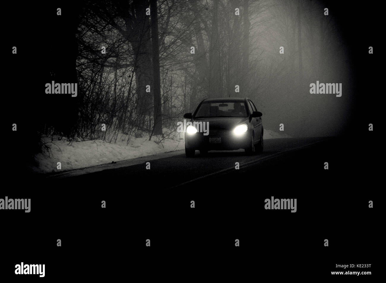 Country road in fog Stock Photo - Alamy