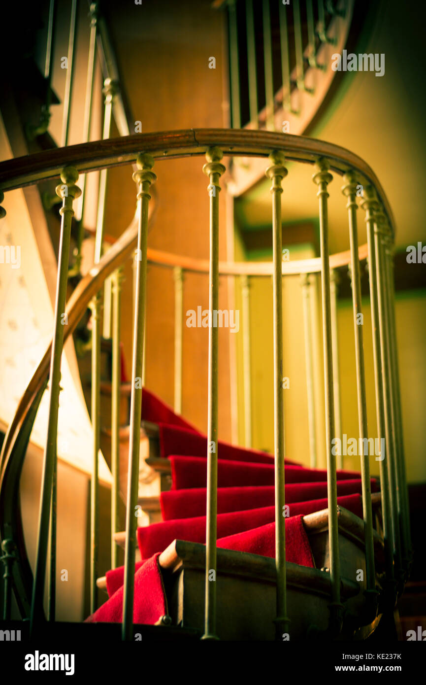 Spiral staircase with a red carpet Stock Photo Alamy