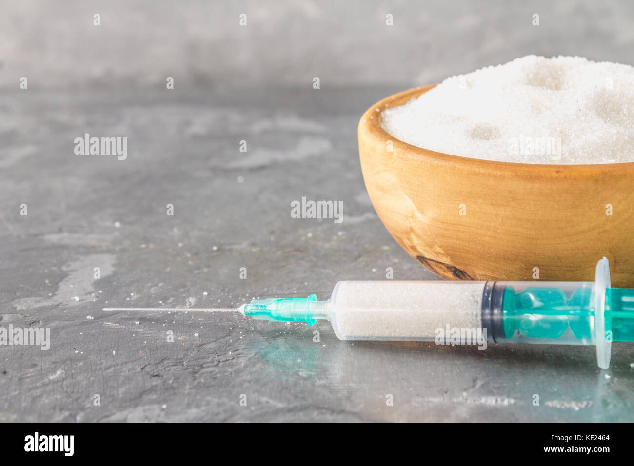 Sugar in a syringe. Conceptual depiction of dependence on the sweet