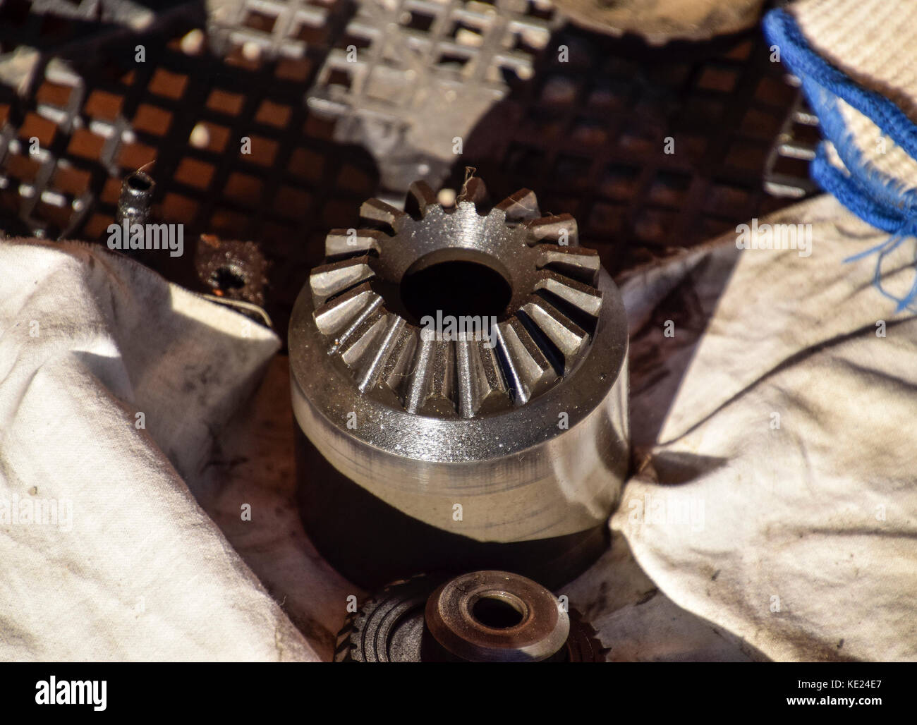 Different cog wheels dismantled from the drive line of a car Stock Photo