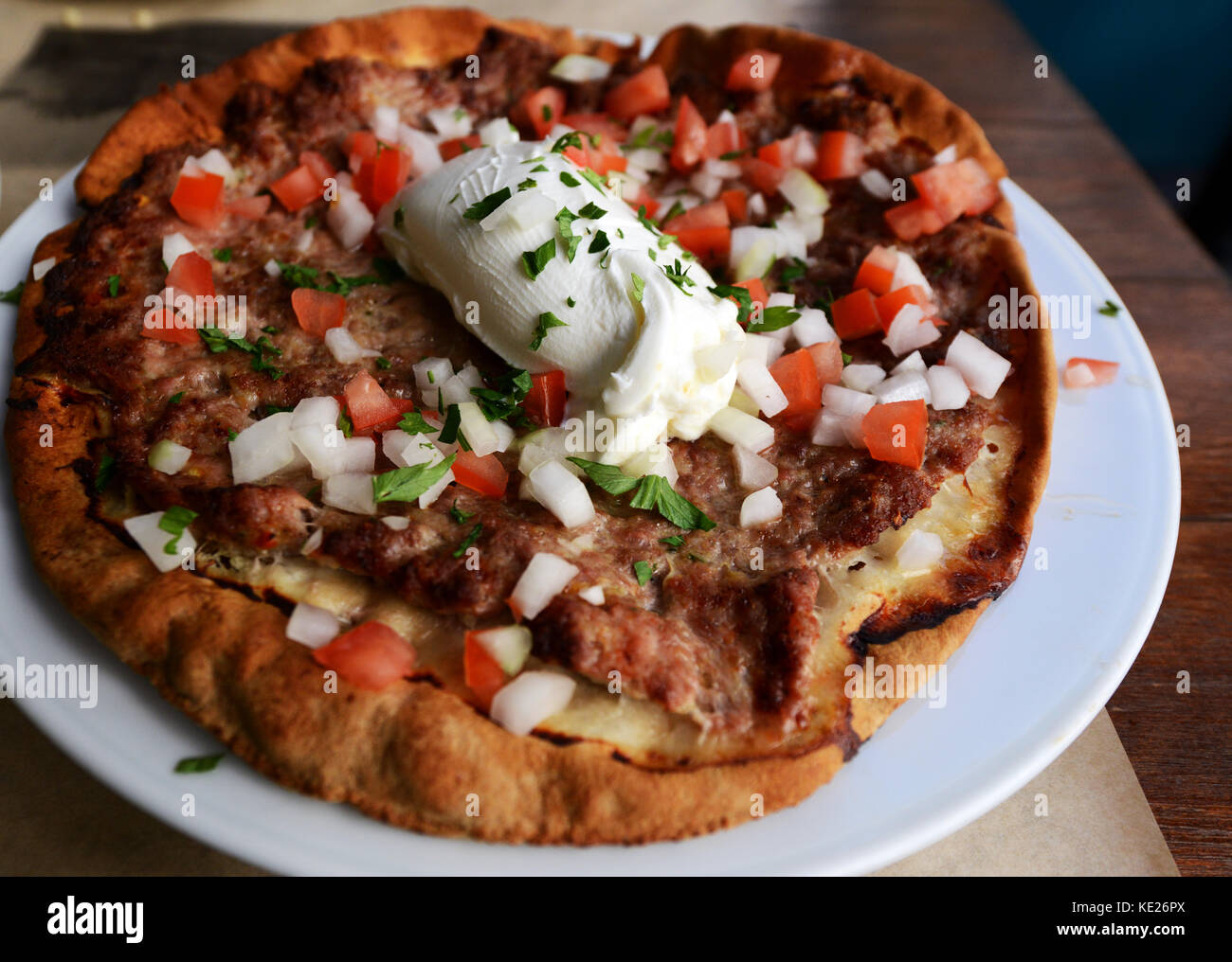 Greek style pizza with minced meat and Greek Yogurt Stock Photo Alamy