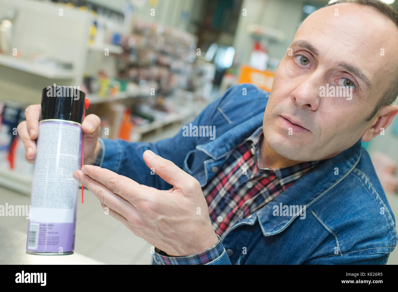 Man showing aerosol can hi-res stock photography and images - Alamy